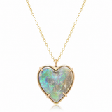 A heart-shaped pendant necklace featuring a vibrant iridescent opal gemstone in a gold bezel setting, suspended from a delicate gold chain against a clean white background.