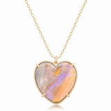 A heart-shaped pendant necklace featuring a colorful opal in a gold bezel setting on a delicate gold chain, shown against a plain white background.