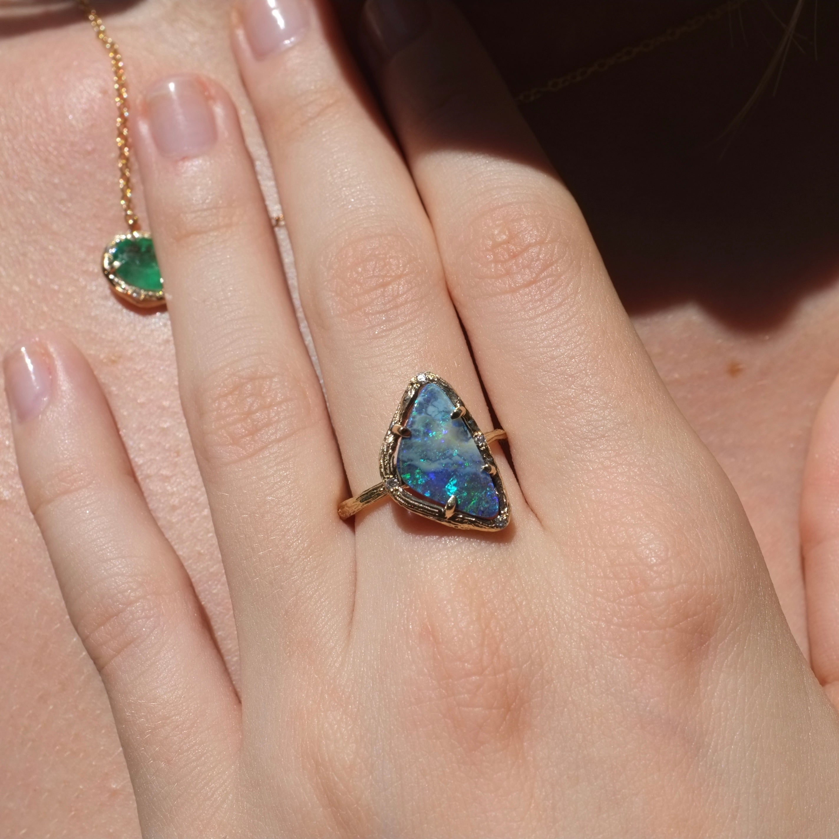 Blue gemstone ring on model
