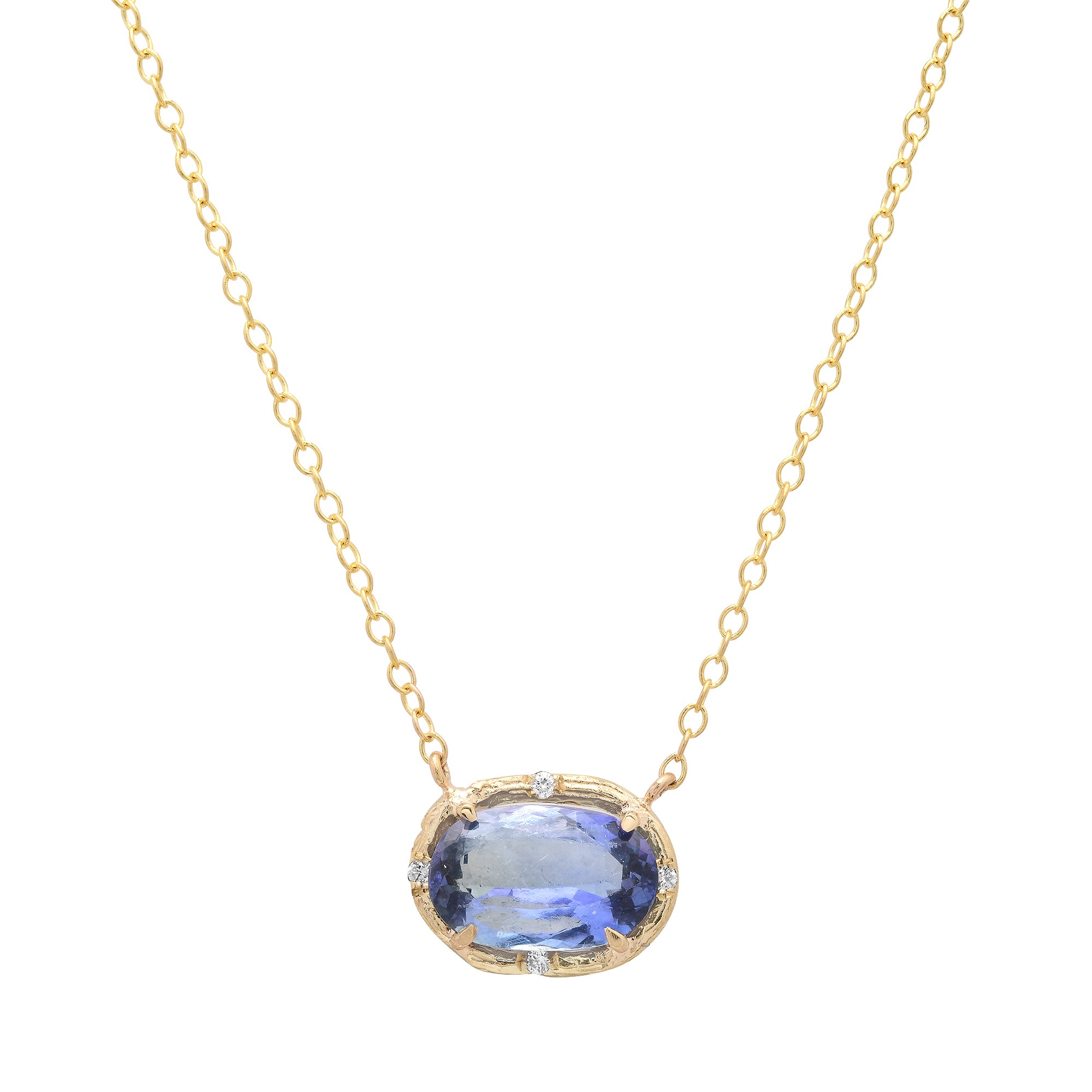 A gold chain necklace with an oval pendant featuring a light blue gemstone and small clear accent stones, shown on a plain white background.